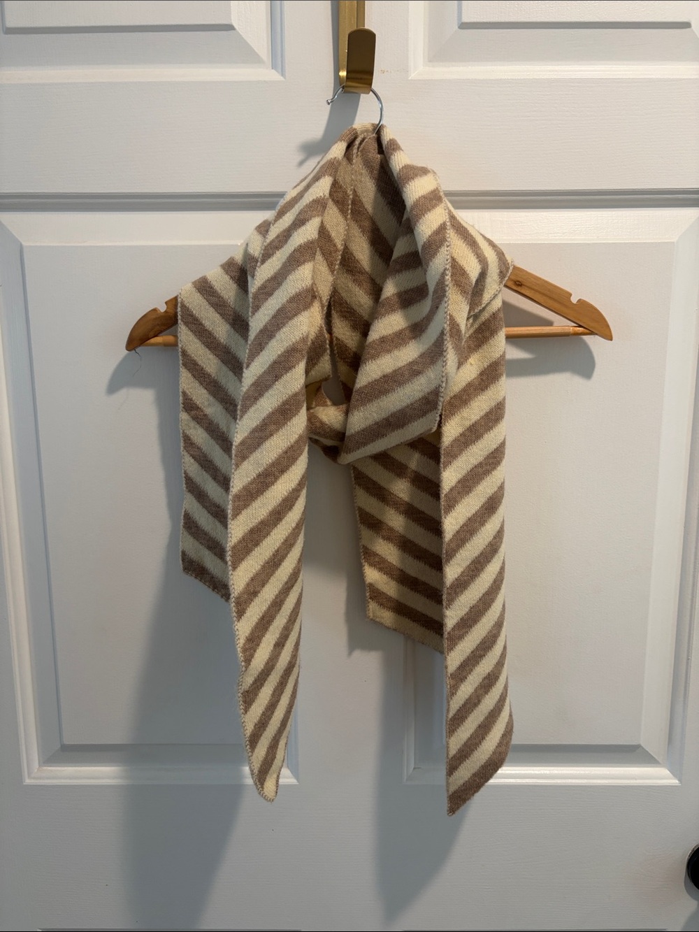 Striped Cream and Tan scarf. Got it at a boutique holiday festival.